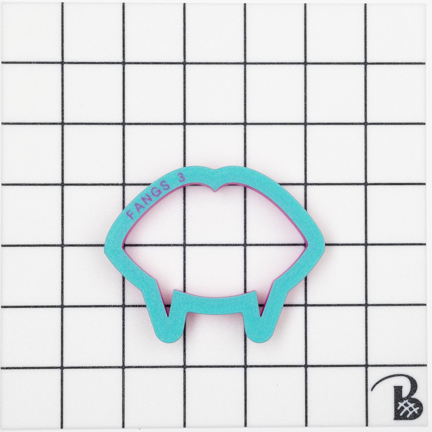 Fangs Cookie Cutter (recommend sizing up)