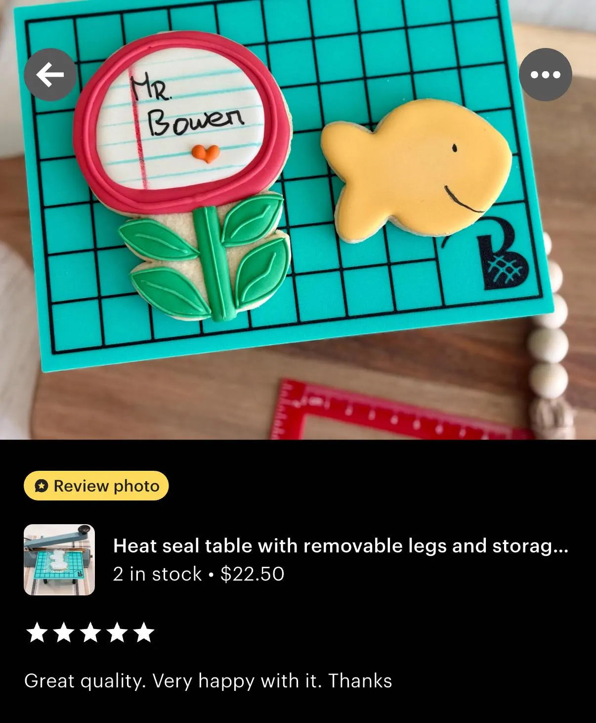 Heat seal table with removable legs and storage compartment