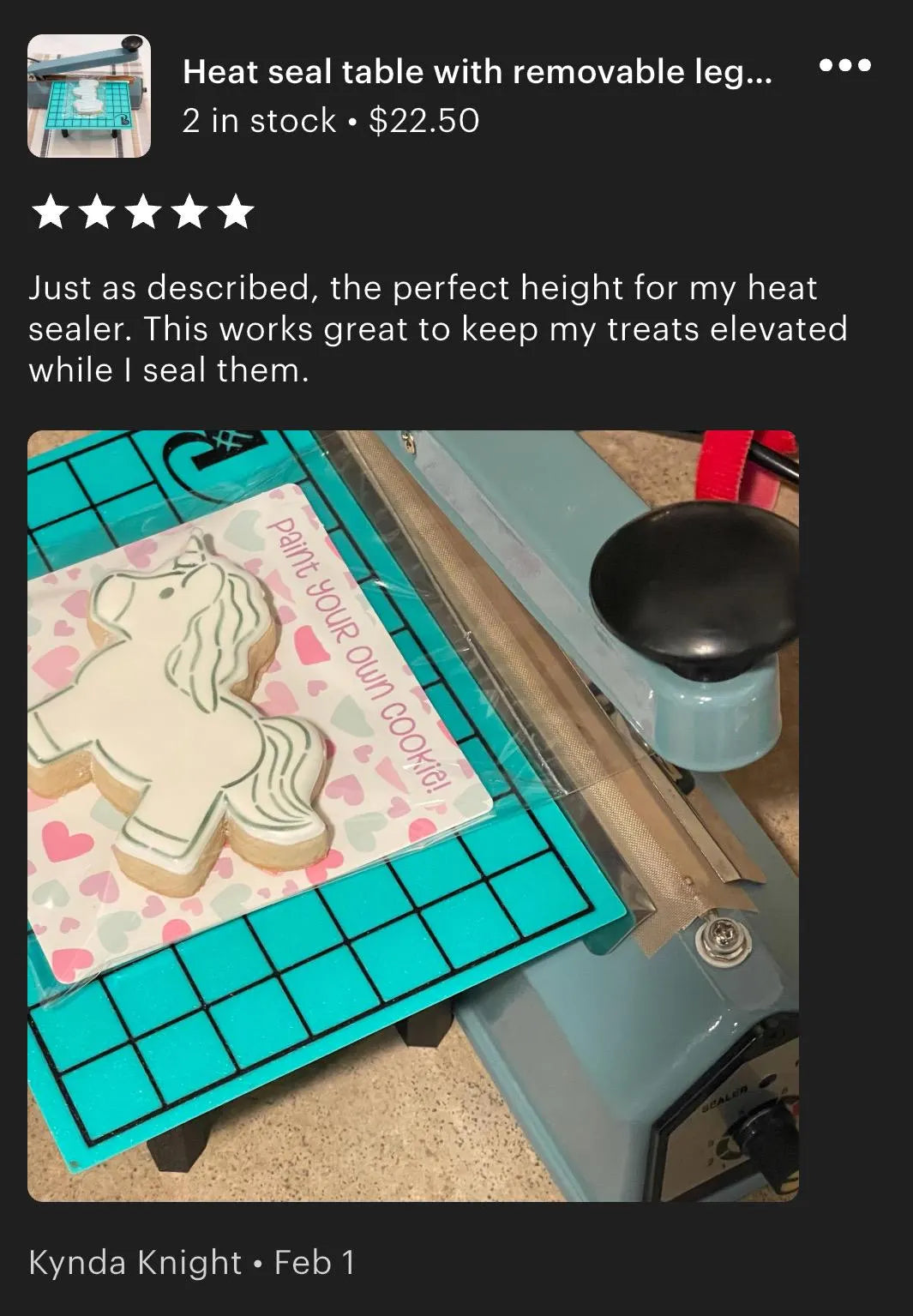Heat seal table with removable legs and storage compartment